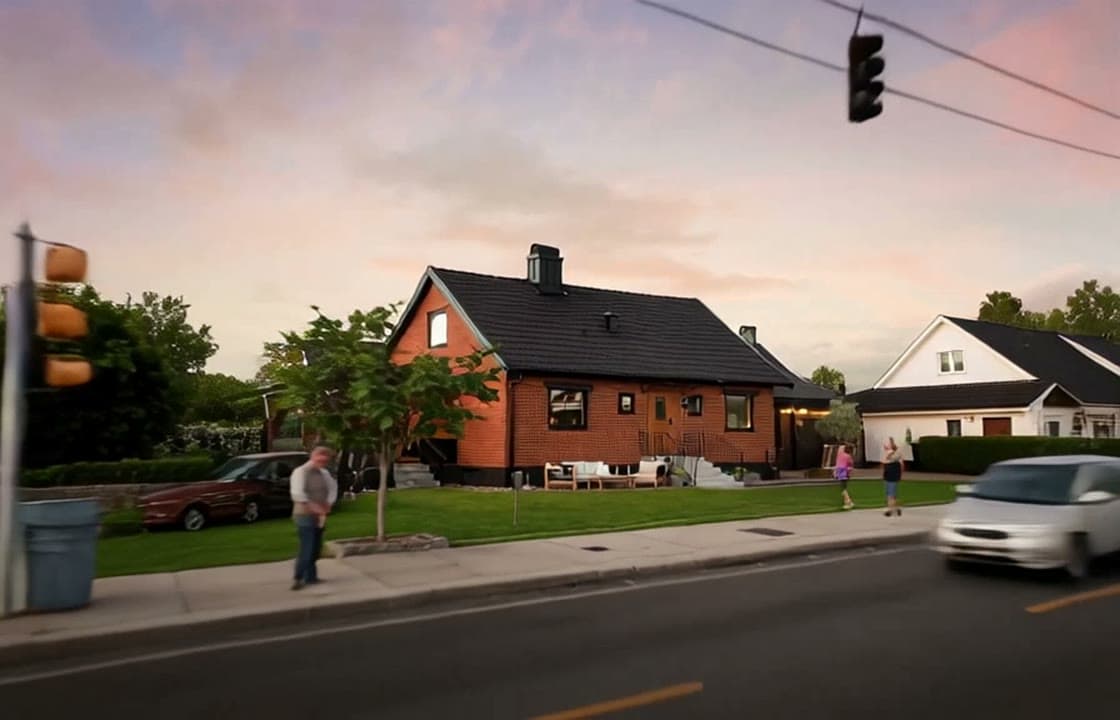 Rejected take: the end frame shows invented pedestrians and a parked car that were not in the photo