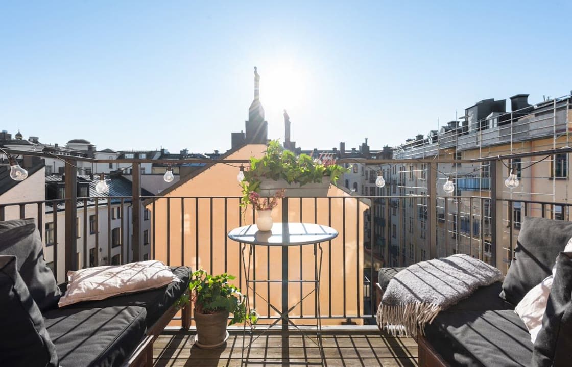 Balcony at golden hour, the listing photo as uploaded